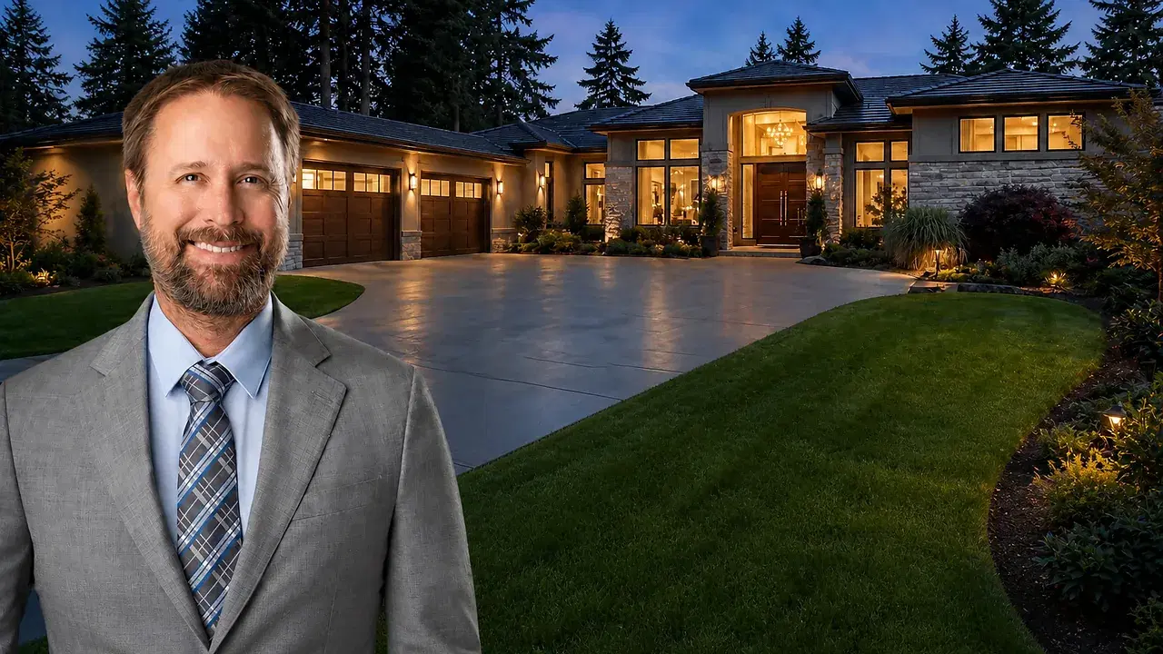 Real estate advisor in front of a luxury home at dusk